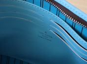 LV 25S POCHETTE VOYAGE 26 IN GASTON BLUE MONOGRAM MACASSAR COATED CANVAS