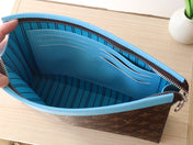 LV 25S POCHETTE VOYAGE 26 IN GASTON BLUE MONOGRAM MACASSAR COATED CANVAS