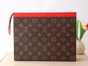 LV 25S POCHETTE VOYAGE 26 IN SARI RED MONOGRAM MACASSAR COATED CANVAS