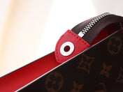 LV 25S POCHETTE VOYAGE 26 IN SARI RED MONOGRAM MACASSAR COATED CANVAS