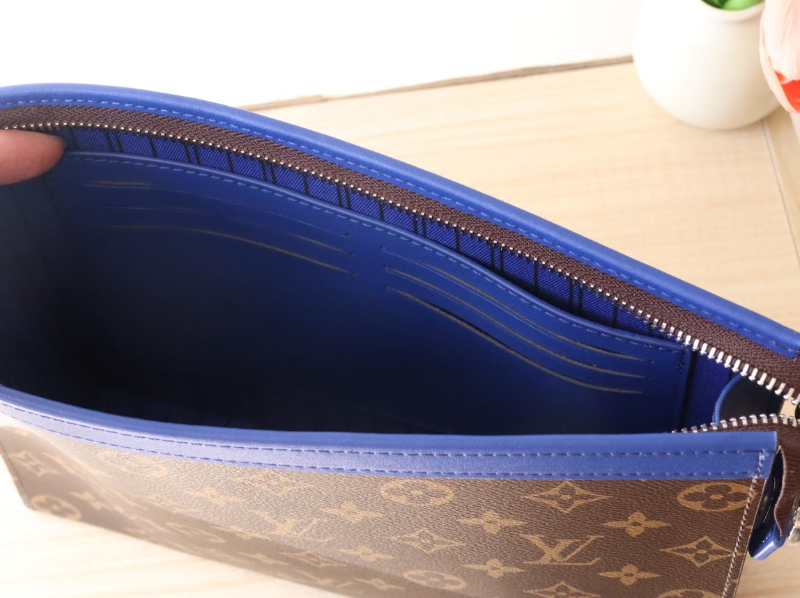 LV 25S POCHETTE VOYAGE 26 IN INDIGO BLUE MONOGRAM MACASSAR COATED CANVAS