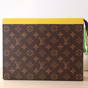 LV 25S POCHETTE VOYAGE 26 IN YELLOW MONOGRAM MACASSAR COATED CANVAS
