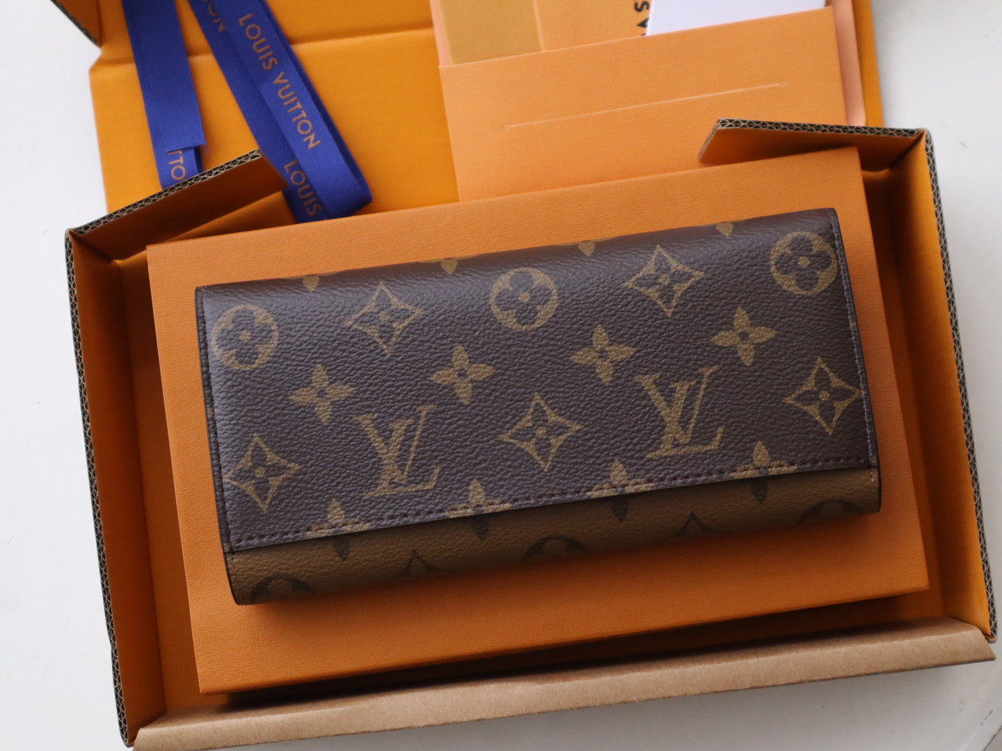 EMILIE WALLET 19 IN CHOCOLATE BROWN MONOGRAM CALFSKIN