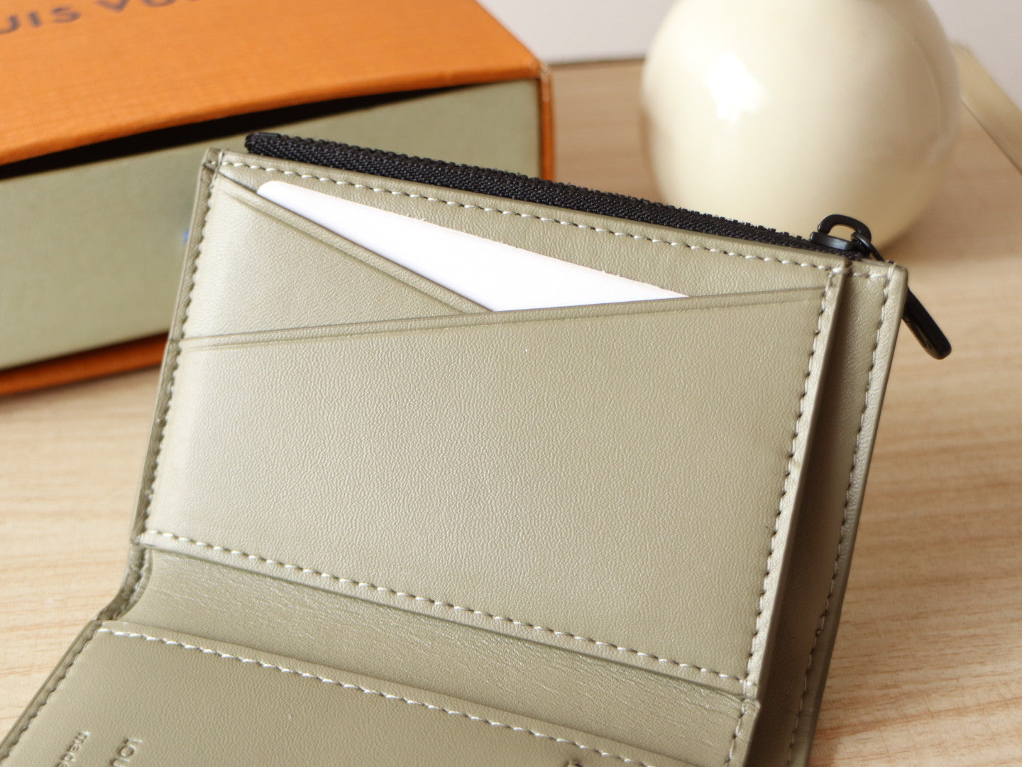 IRIS WALLET IN KHAKI BROWN EMBOSSED CALFSKIN