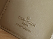 IRIS WALLET IN KHAKI BROWN EMBOSSED CALFSKIN