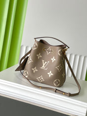 CRAFTY NEONOE 26 IN BROWN AND CREAM BICOLOR EMPREINTE CALFSKIN