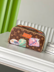 COMPARTMENTS 24 IN BROWN MONOGRAM CANVAS WITH GOLD LOCK