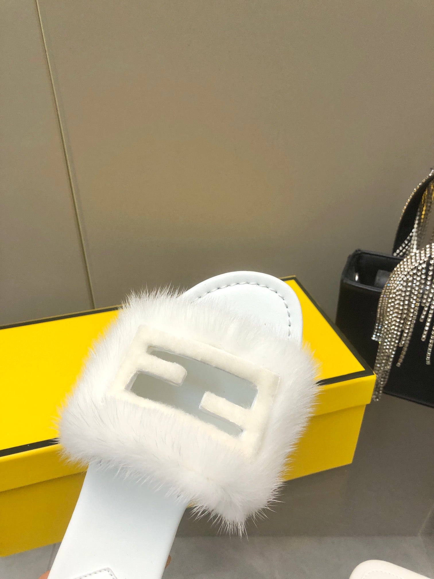FENDI BAGUETTE MINK SLIDE SLIPPER IN WHITE FUR