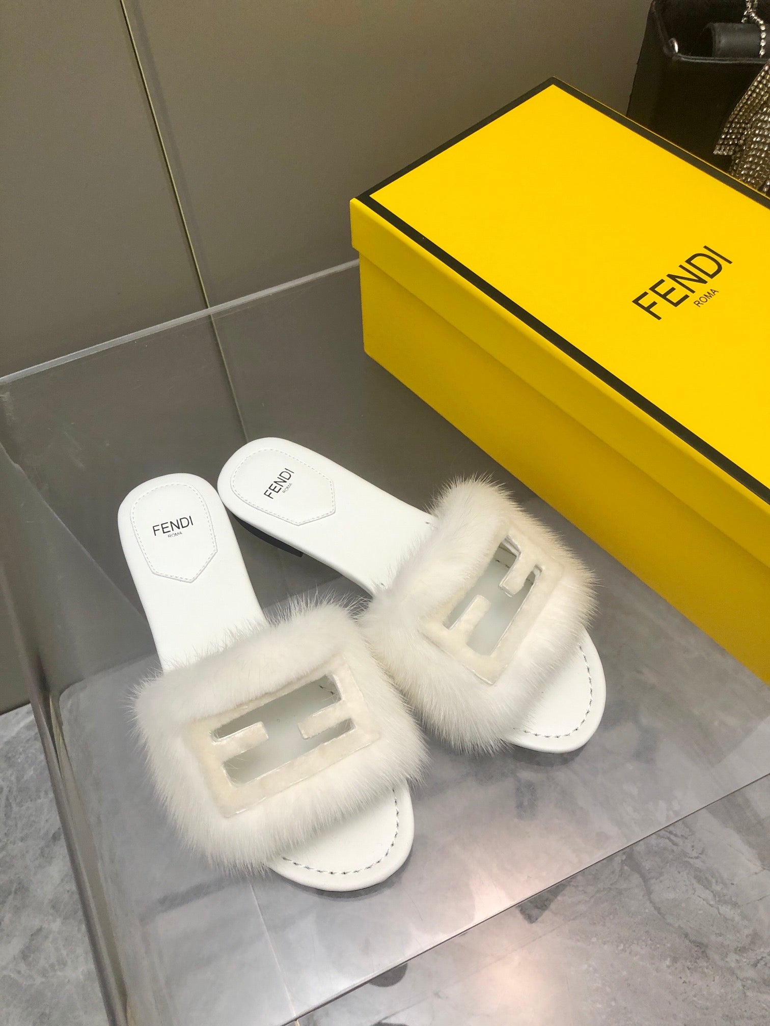 FENDI BAGUETTE MINK SLIDE SLIPPER IN WHITE FUR