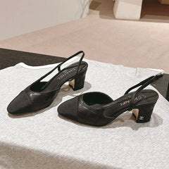 HIGH SLINGBACKS IN BLACK LAMBSKIN AND SATIN