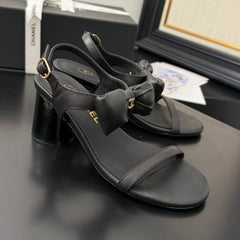 MID HEEL SANDALS IN BLACK CALFSKIN WITH BOW