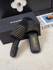 FLAT SLIDE IN BLACK SUEDE WITH CRYSTALS