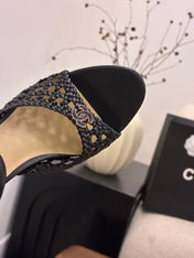 CHANEL 26S HIGH-HEELED BACK-STRAP SANDALS 60 MM IN BLACK WOVEN LAMBSKIN