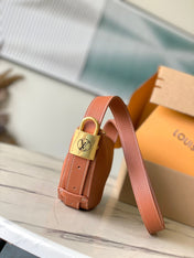 LOW KEY BUMBAG 28 IN SPANISH ORANGE CALFSKIN GOLD BUCKLE