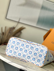 NEVERFULL MM 31 IN LAGOON BLUE MONOGRAM TILES CANVAS