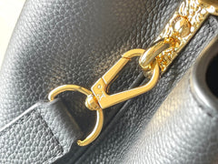 CAPUCINES EAST-WEST 33 IN BLACK CALFSKIN GOLD HARDWARE