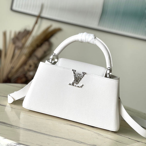 CAPUCINES EAST-WEST 33 IN WHITE CALFSKIN SILVER HARDWARE