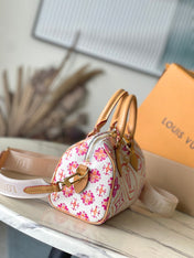 SPEEDY BANDOULIÈRE 20 IN CORAL MONOGRAM TILES CANVAS GOLD BUCKLE