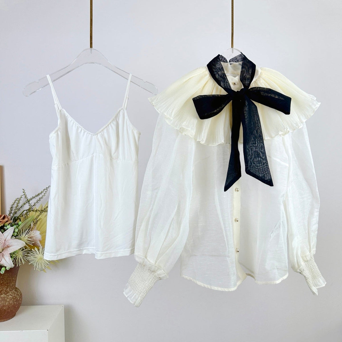 WHITE DRESSY TOP WITH BLACK TIE-NECK