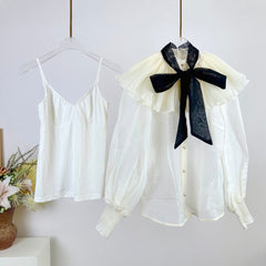 WHITE DRESSY TOP WITH BLACK TIE-NECK