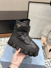MONOLITH ANKLE BOOTS WITH STRAP IN BLACK CALFSKIN AND FLEECE LINING