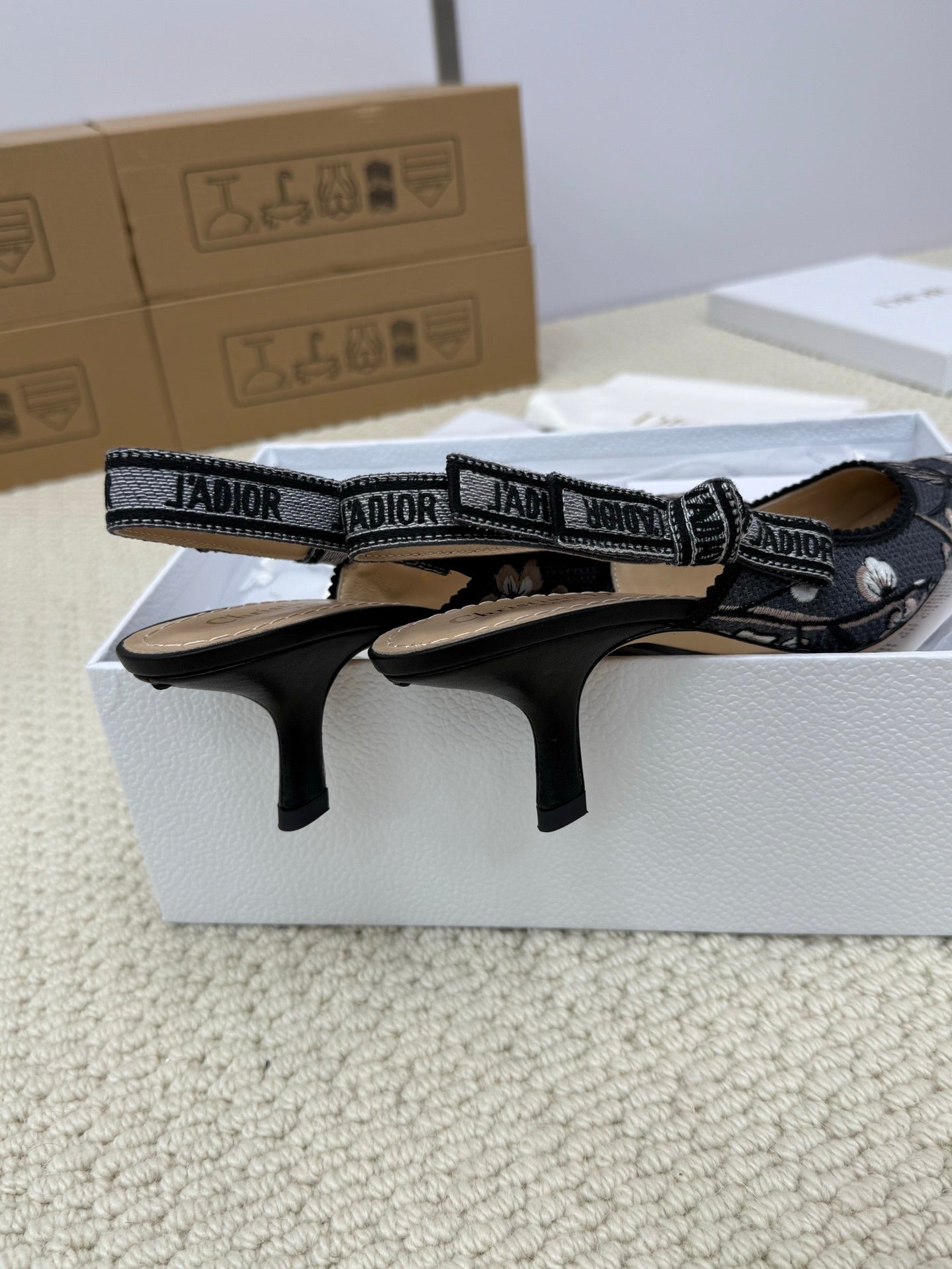DIOR HIGH SLINGBACK 65 MM 25S IN BLACK FABRIC AND FLORAL PATTERN