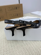 DIOR HIGH SLINGBACK 65 MM 25S IN BLACK FABRIC AND FLORAL PATTERN