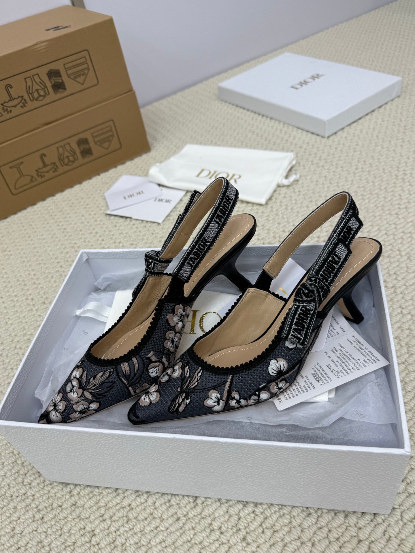 DIOR HIGH SLINGBACK 65 MM 25S IN BLACK FABRIC AND FLORAL PATTERN