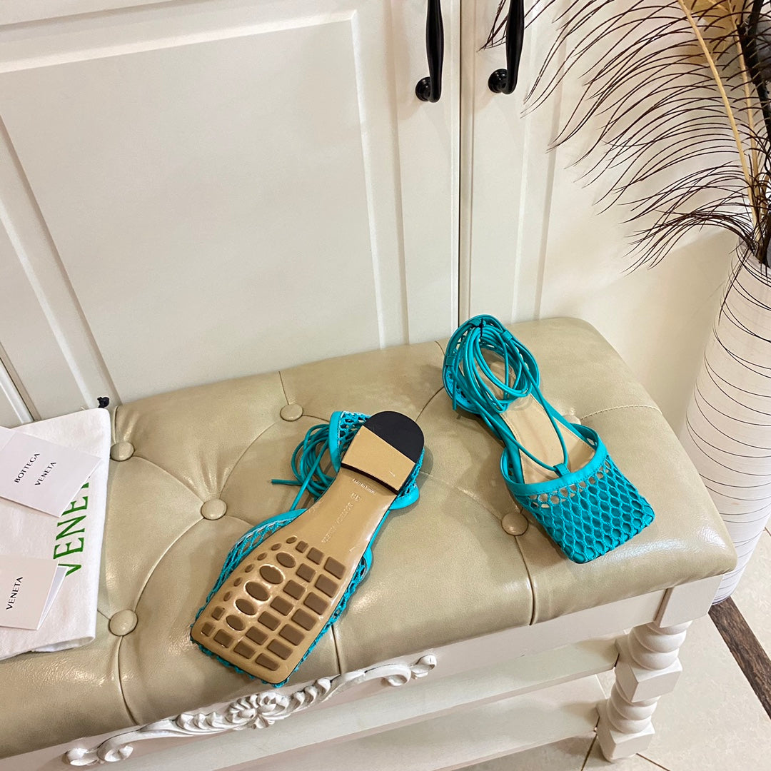 STRETCH LACE-UP FLAT SANDAL IN CERULEAN BLUE METALLIZED MESH AND LEATHER