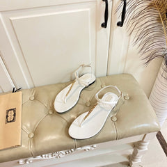 GG SIGNORINA THONG SANDALS IN WHITE SHEEPSKIN