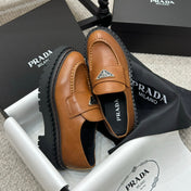 PRADA 25S LOAFER 50MM IN BURNT ORANGE CALFSKIN LOGO