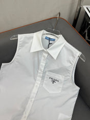WHITE SLEEVELESS BUTTON-UP SHIRT