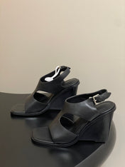 HM 25S KALYA WEDGE SANDAL 100 MM IN BLACK LAMBSKIN
