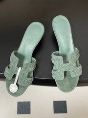 HM 25S ORAN HIGH‑HEEL SANDAL IN MUTED MINT GREEN SUEDE AND LAMBSKIN
