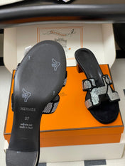 HM 25S ORAN HIGH‑HEEL SANDAL 50 MM IN BLACK LAMBSKIN WITH WHITE STONE DETAILS