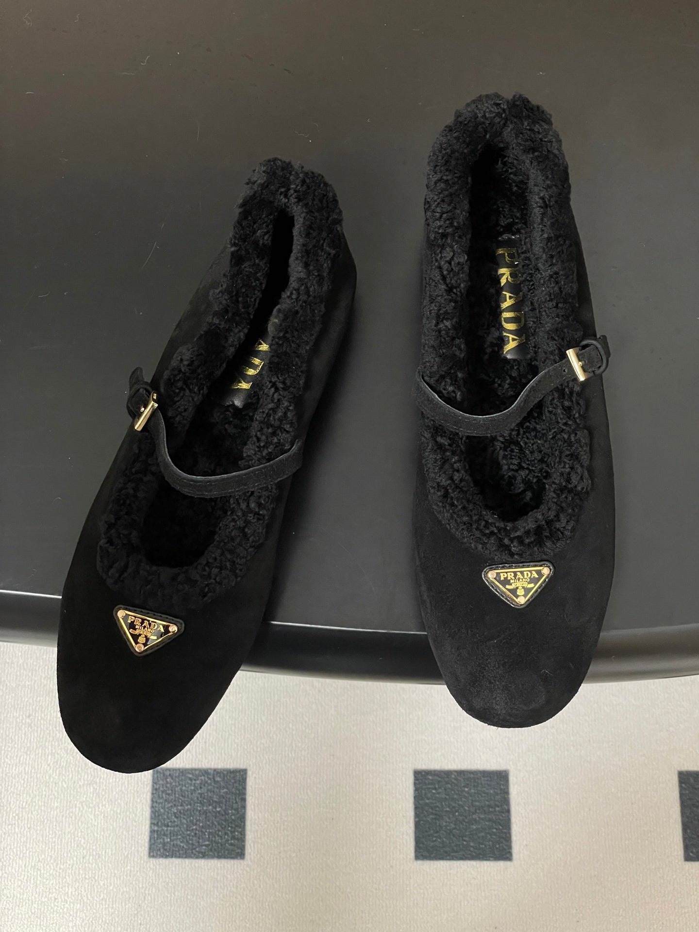PRADA 25S MARY JANE FLATS IN BLACK SUEDE WITH GOLD HARDWARE