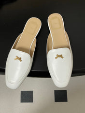 DIOR 26S MULES IN WHITE CALFSKIN WITH BOW
