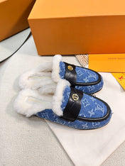 FLAT MULE IN COBALT BLUE MONOGRAM DENIM AND SHEARLING LINING