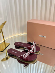 SLIDES SANDALS IN BURGUNDY RED CALFSKIN BOW IN TRAP