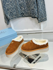 TRIANGLE LOGO MULES IN BRONZE BROWN SUEDE AND SHEARLING LINING