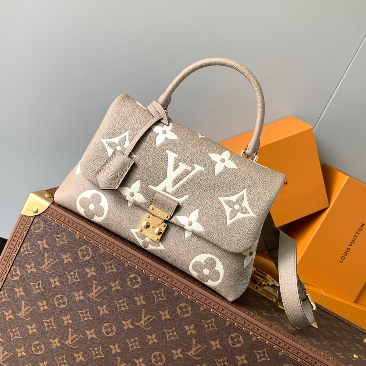 MADELEINE 30 IN BEIGE MONOGRAM CALFSKIN EMBOSSED LOGO