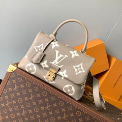 MADELEINE 30 IN BEIGE MONOGRAM CALFSKIN EMBOSSED LOGO