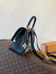 MADELEINE 30 IN BLACK MIX WHITE MONOGRAM CALFSKIN EMBOSSED LOGO