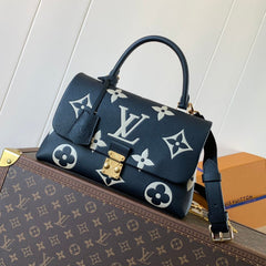 MADELEINE 30 IN BLACK MIX WHITE MONOGRAM CALFSKIN EMBOSSED LOGO