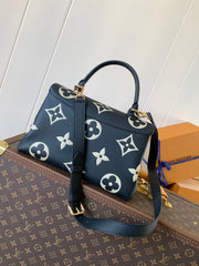 MADELEINE 30 IN BLACK MIX WHITE MONOGRAM CALFSKIN EMBOSSED LOGO