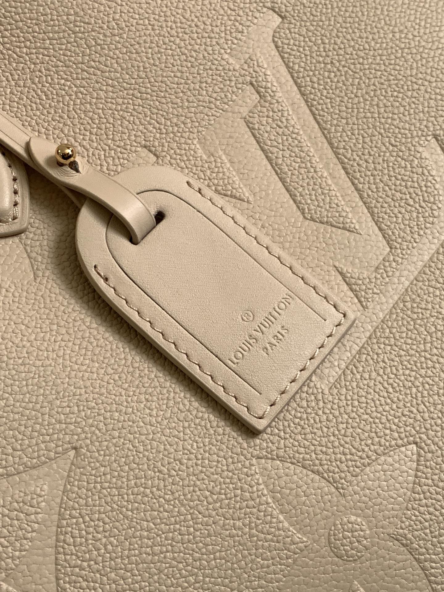 ONTHEGO 35 IN LIGHT BEIGE MONOGRAM CALFSKIN