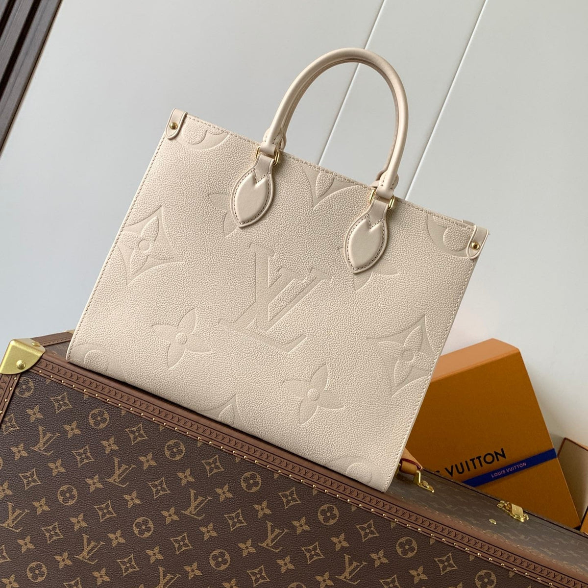 ONTHEGO 35 IN LIGHT BEIGE MONOGRAM CALFSKIN