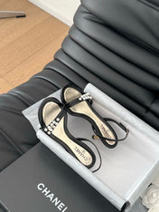 PEARL SANDAL IN BLACK AND GOLD LAMBSKIN 75 MM