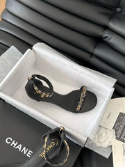 MID-HEEL 35 MM SANDAL IN BLACK SHEEPSKIN WITH STICKERS