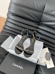 MID-HEEL 35 MM SANDAL IN BLACK SHEEPSKIN WITH STICKERS